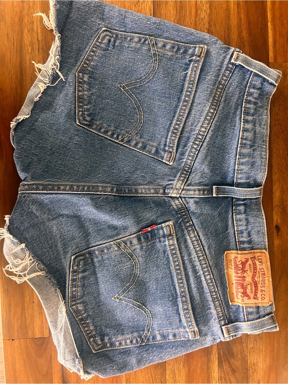 Levi's Blue Denim Cutoff Shorts with Frayed Hem